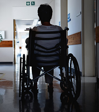 man sitting on wheel chair