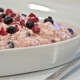 An image of a bowl of berry rice pudding.