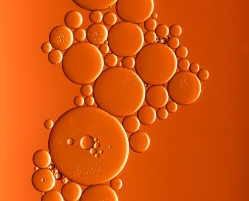 An image of orange bubbles on an orange background. 