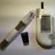 An image of a lancet, test strips, and a glucose monitor for testing blood sugar.