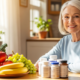 Senior woman with vitamins and fresh produce for dental health after 60